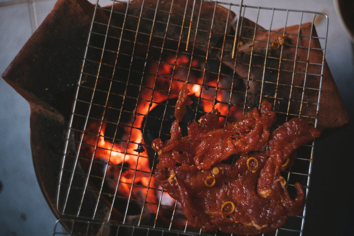 raw meta on grill