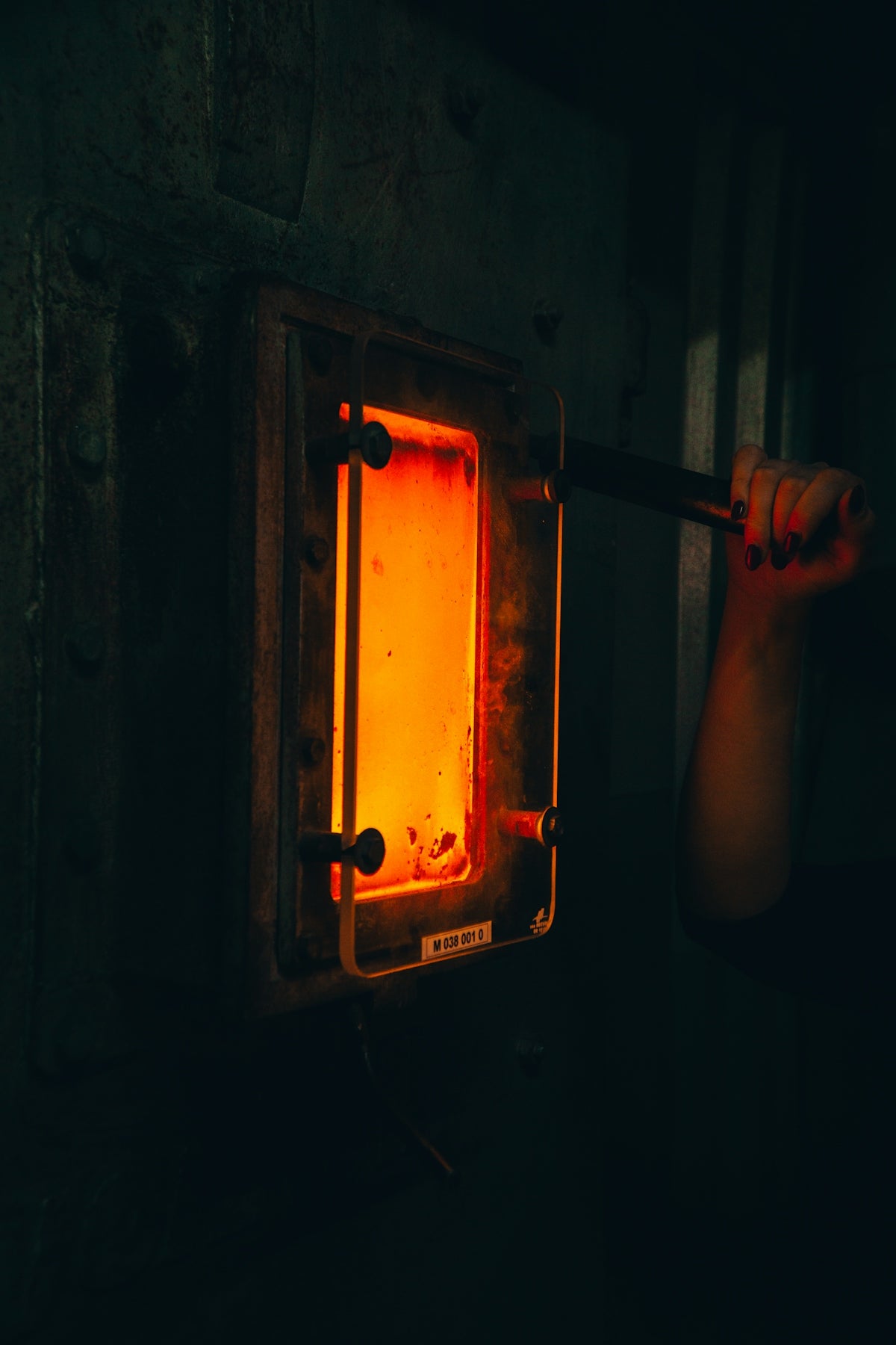 person holding black metal frame