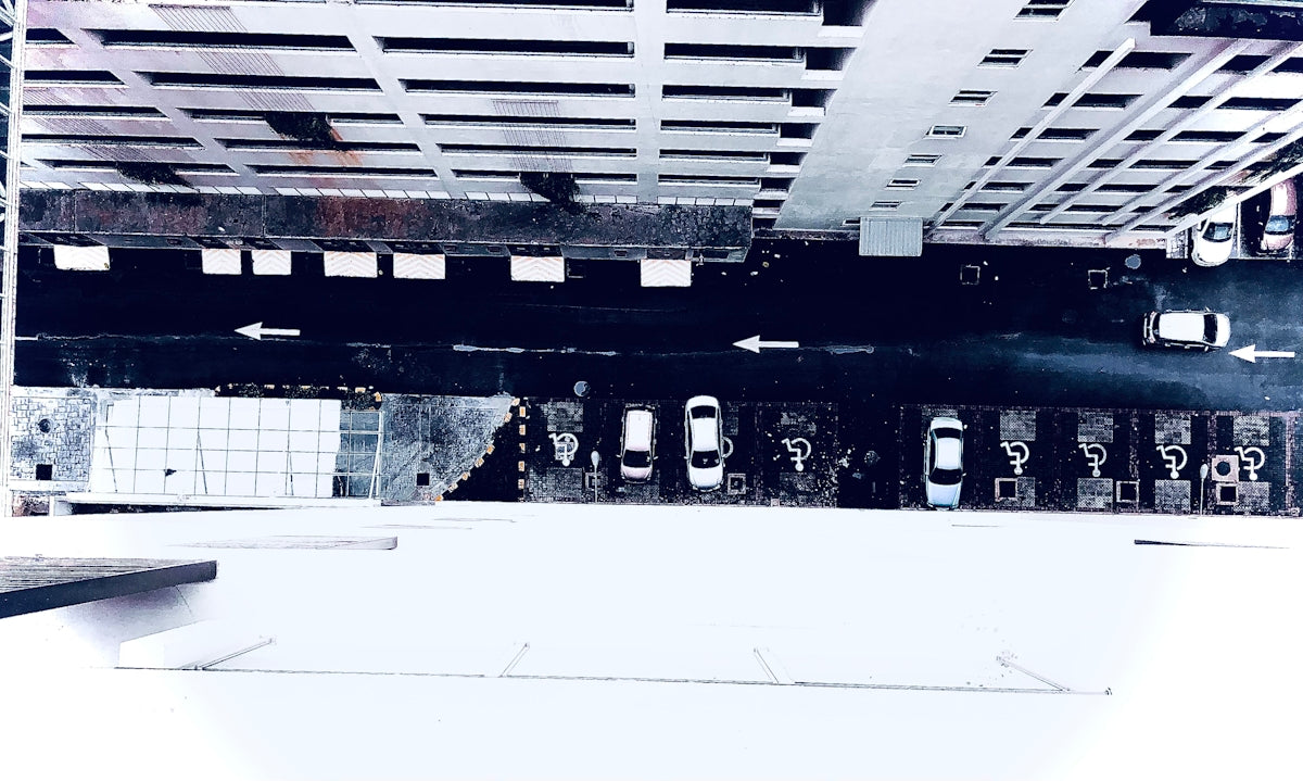 a black and white photo of a parking garage