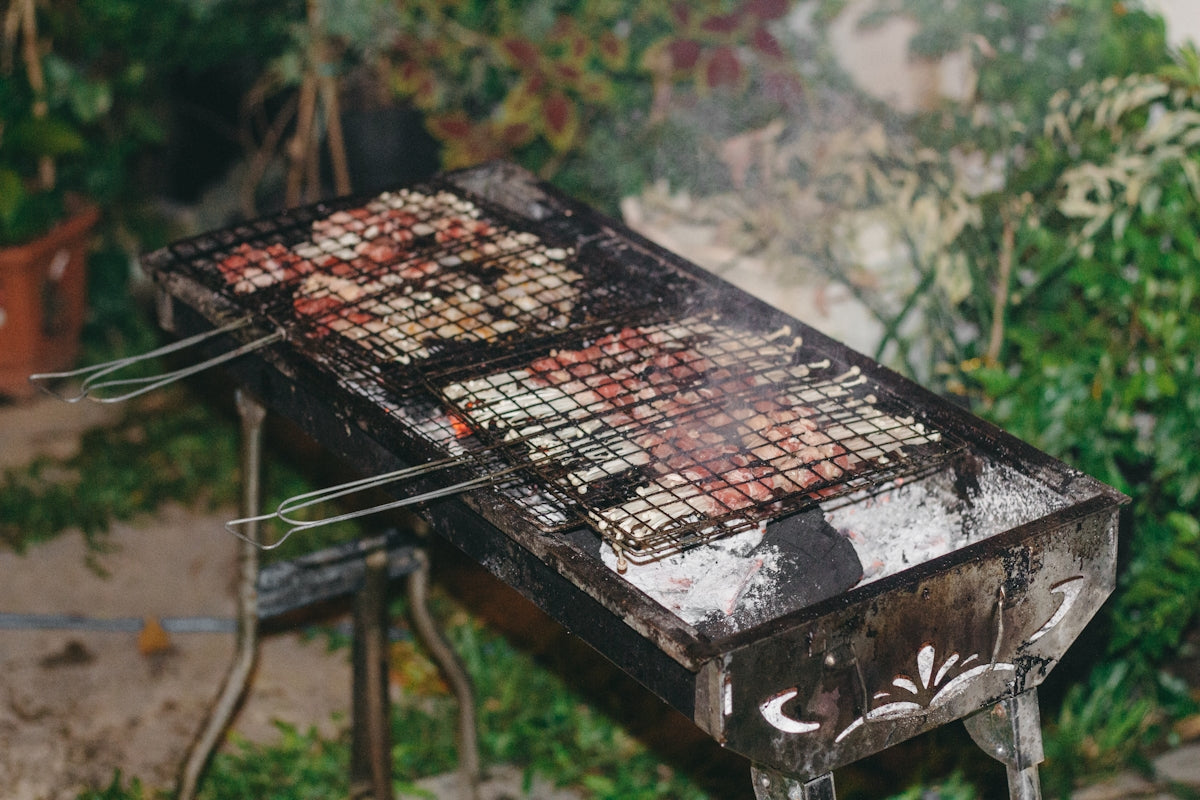 a grill that has some food on it