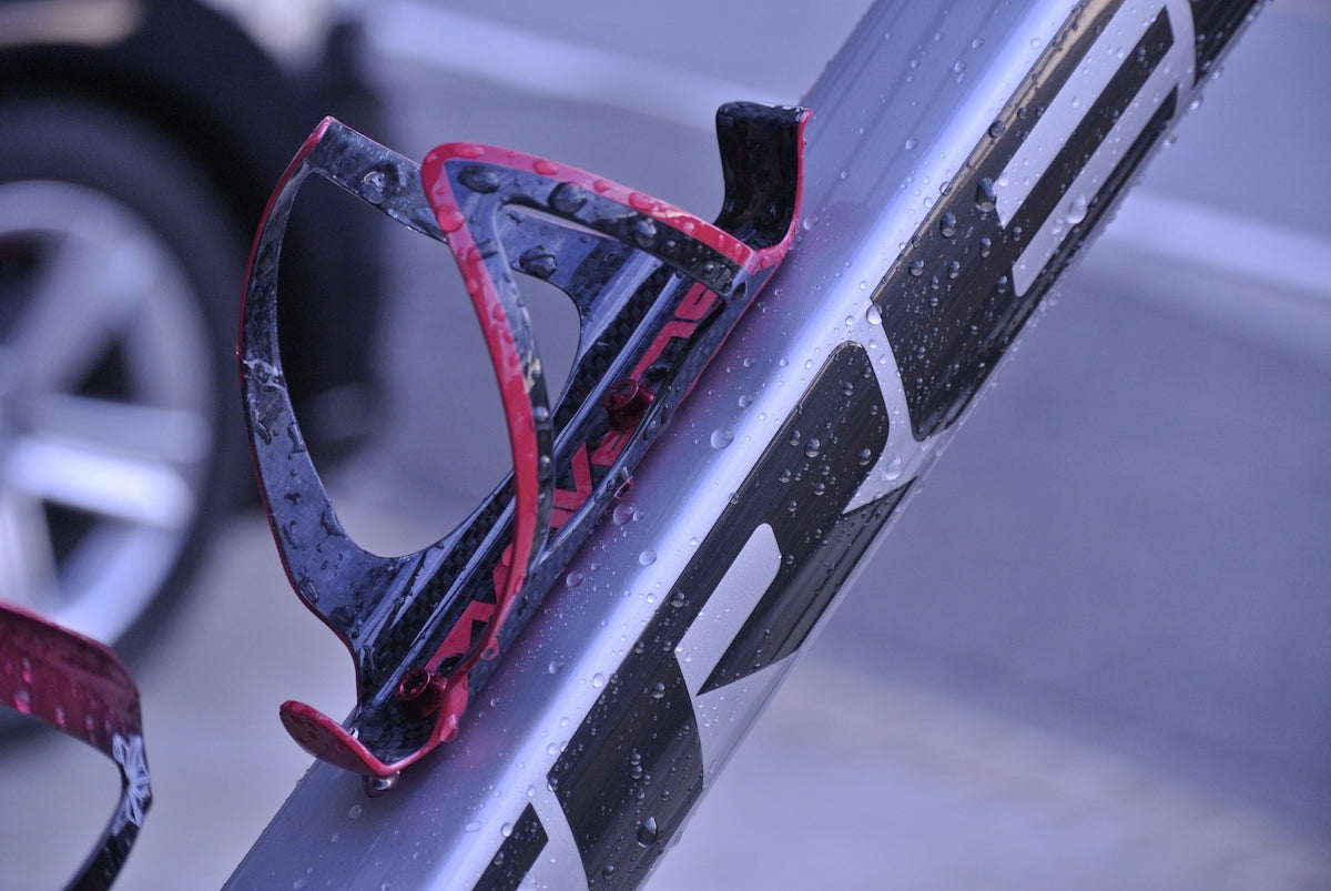a close up of a metal pole with a pair of skis on it