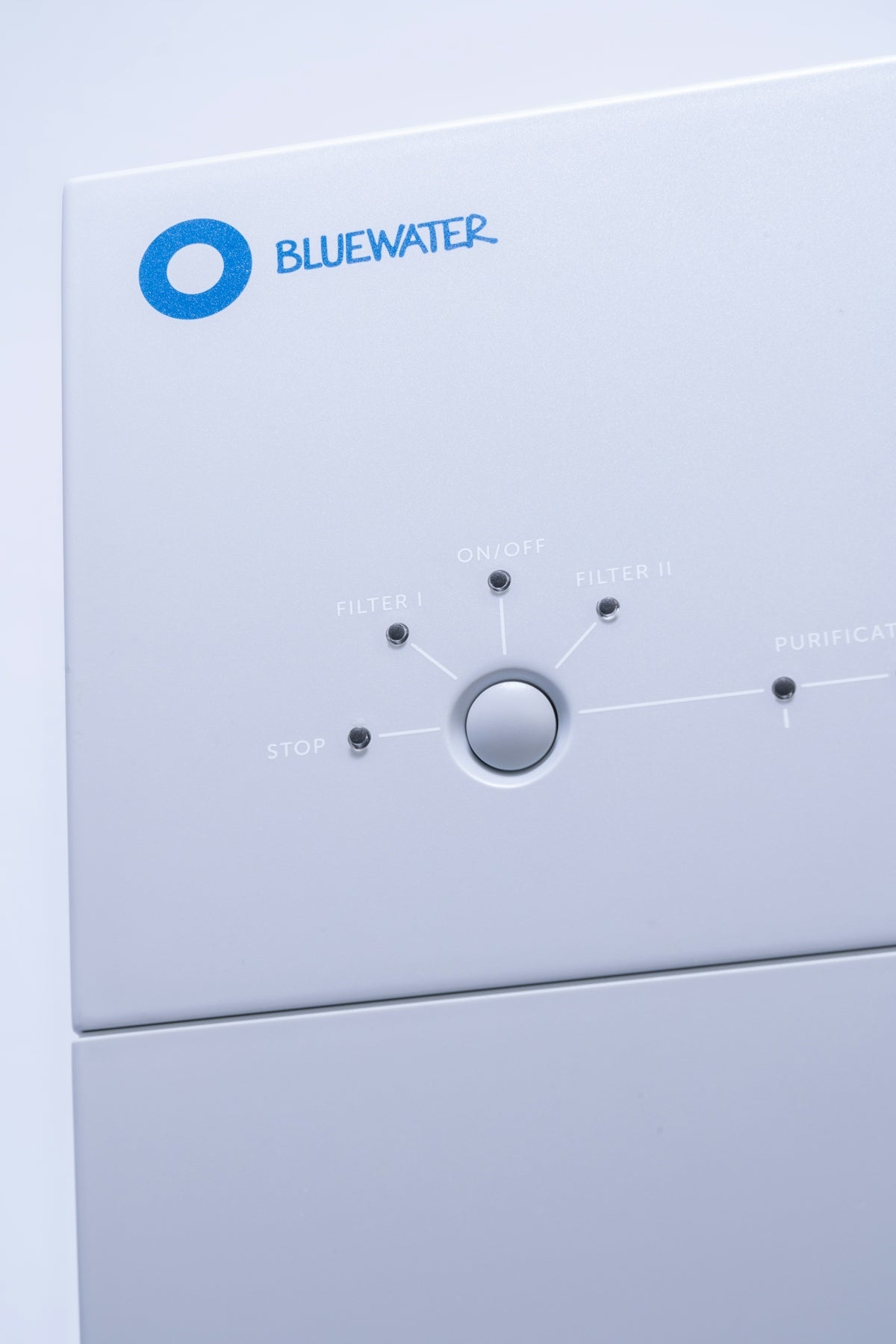 a white rectangular device with a blue screen