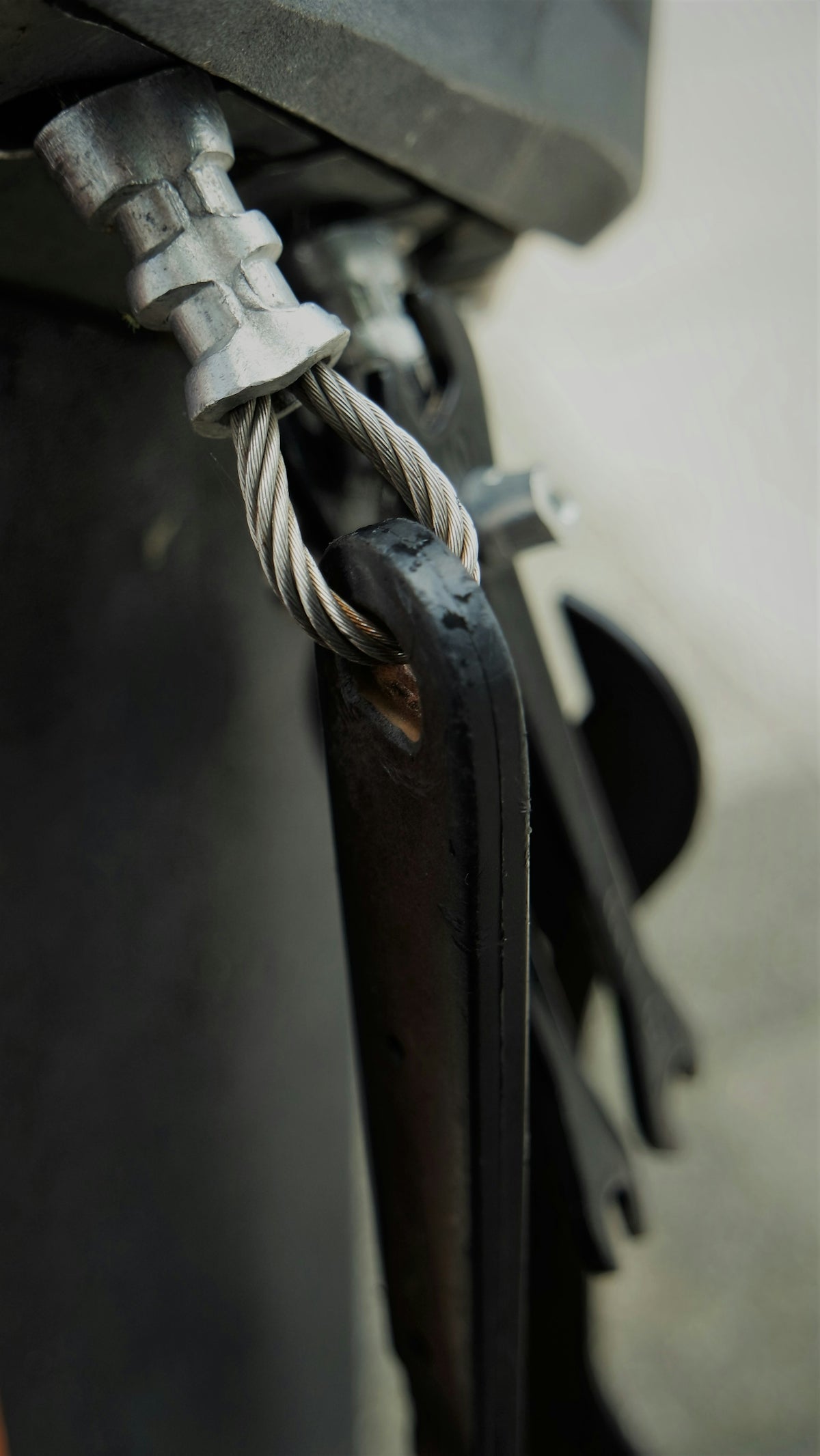 a close up of a cable connected to a motorcycle
