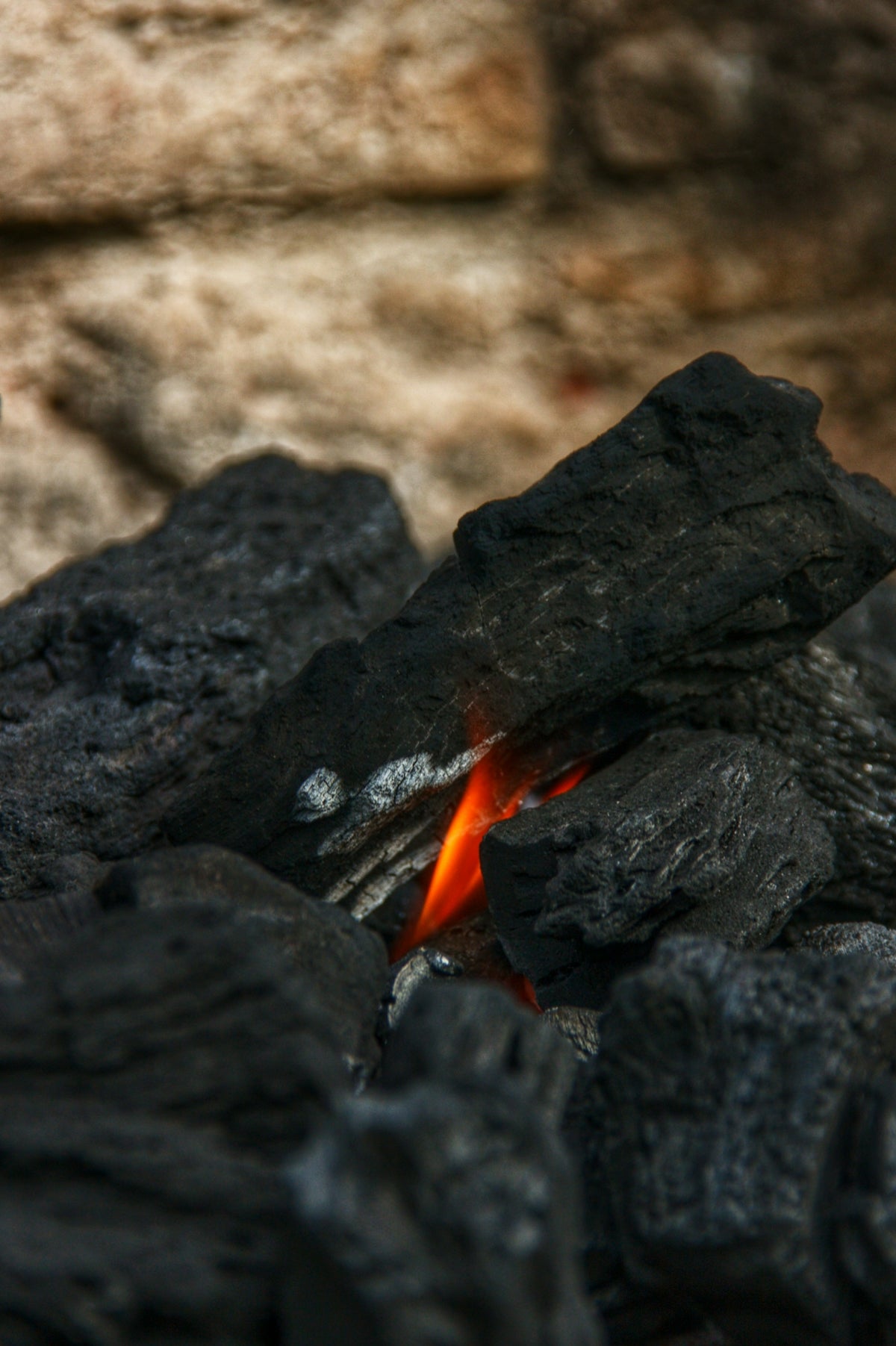 a close up of a fire in a grill