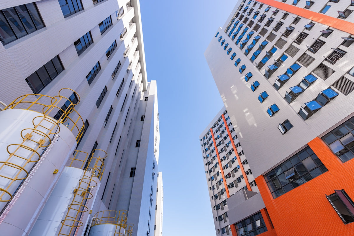 a couple of tall buildings next to each other