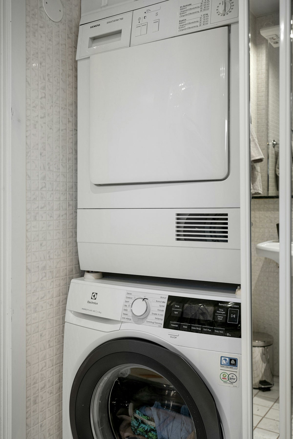 A washer and dryer stacked on top of each other