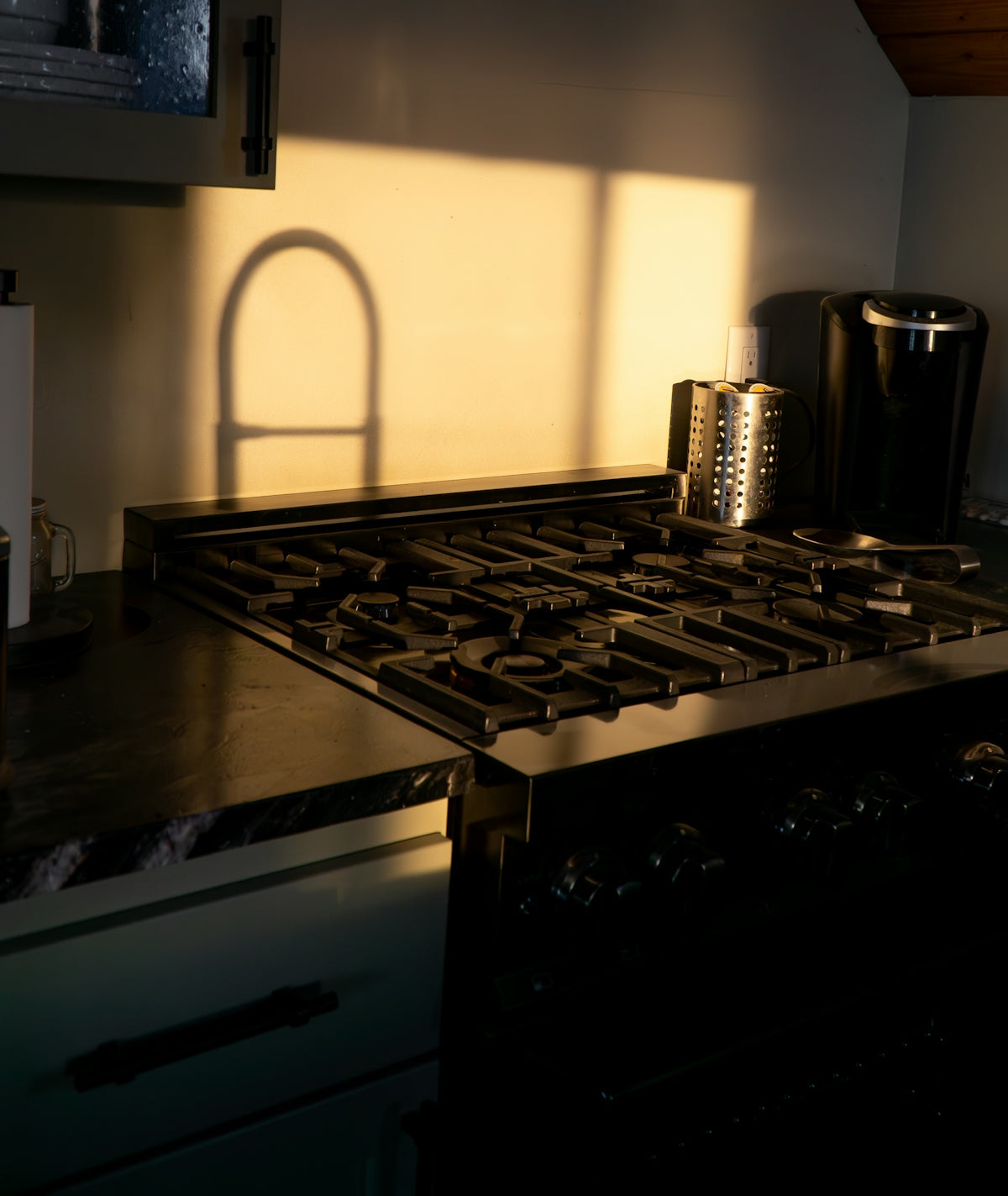 A stove top oven sitting inside of a kitchen