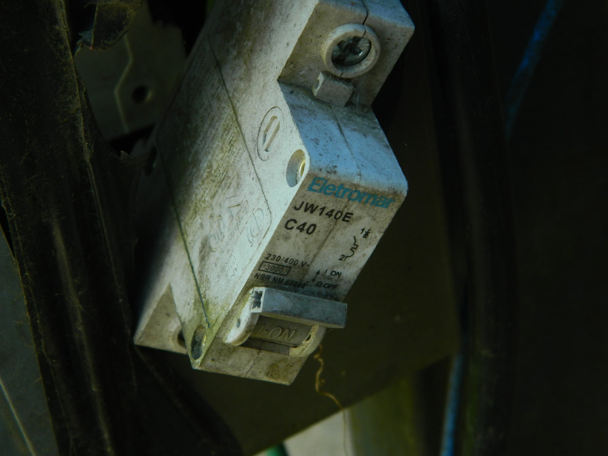 A close up of a switch box on a wall