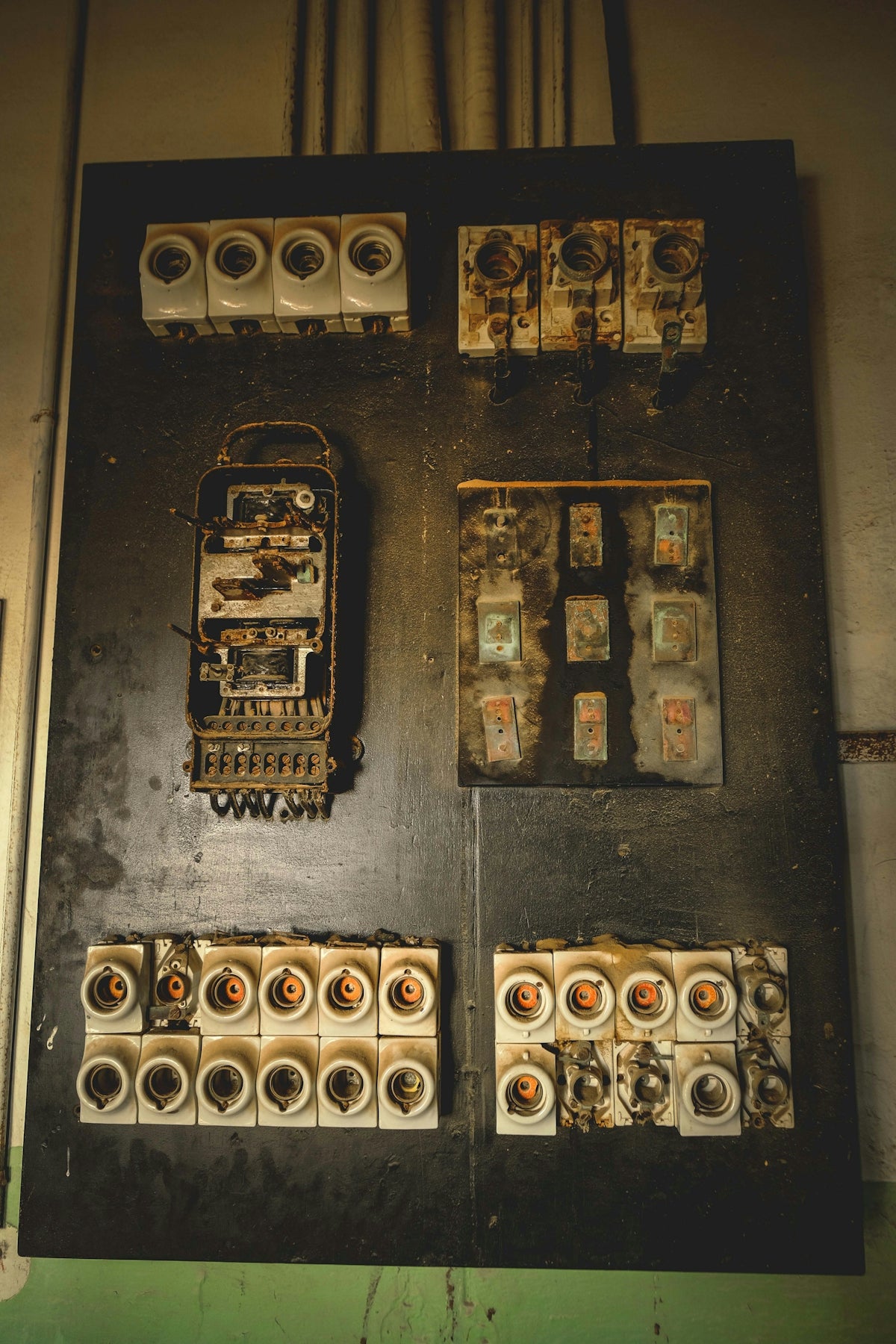 Old and damaged electrical panel.