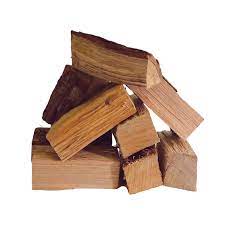BBQ grill wood log bundles stacked for smoking and grilling with natural wood texture